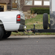 Sitting level. The parking brake works well, but the wheel chocks are an extra security.